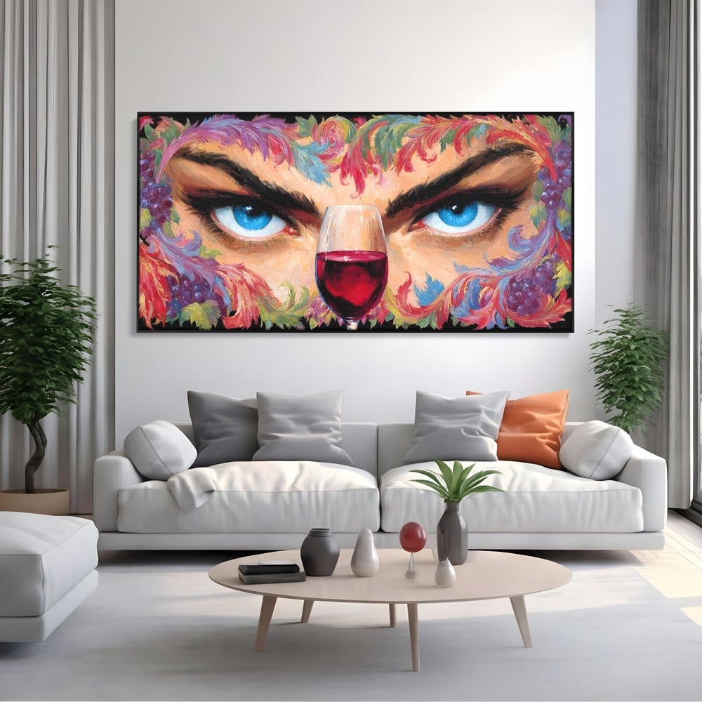 Tablou canvas cu tablou canvas cu ochi albastri si pahar de vin, in rama de aluminiu negru, pe perete intr-un living